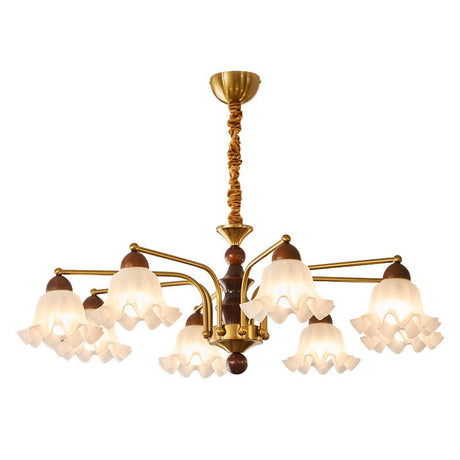 Fluted glass bells and the gold collars holding them to the arms