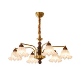 The eight light build with fluted bells ringed around the stem