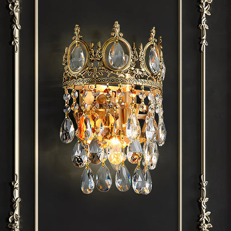 The crown lamp lit on a black wall with gold molding