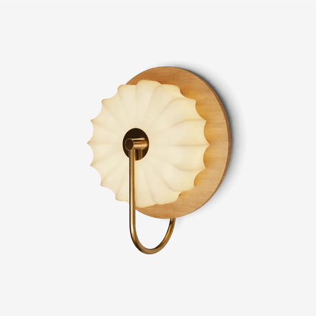 French wall sconce, a pleated white shade on a brass hook off a walnut plate