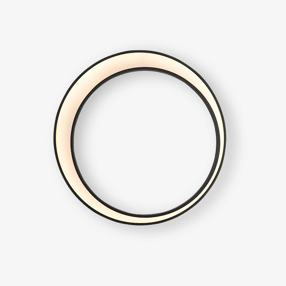 Large black ring garden wall light with a lit crescent of warm light inside