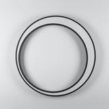The ring unlit on a plain wall, the black frame and white diffuser visible