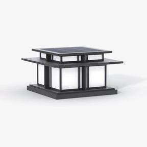 Two tier post cap with a flared roof over a square frame and pale panels