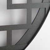 Close view of the textured black steel lattice where it meets the outer ring