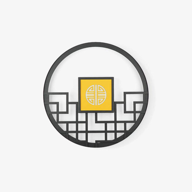 Large round outdoor wall light, a black lattice ring around a glowing square center panel