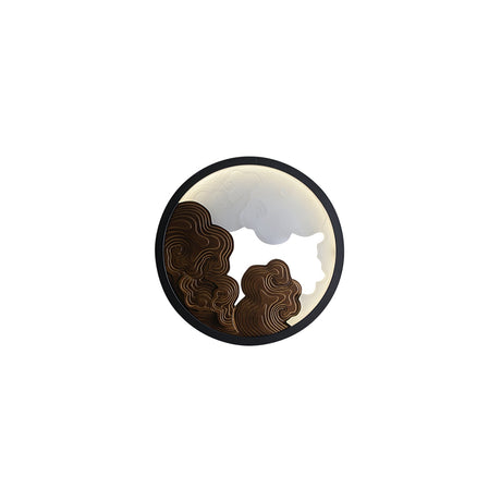 The walnut relief version with the lit disc showing between the layers