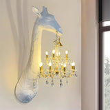 The giraffe lamp lit on a pale wall beside a tall window