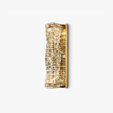 Tall gold wall light faced with stacked rows of cut crystal blocks