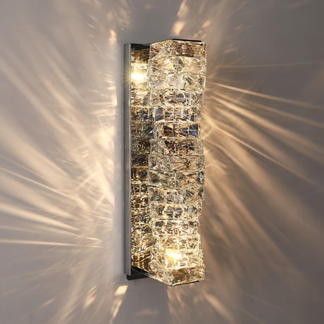 The tallest size lit, light streaming out between the crystal rows