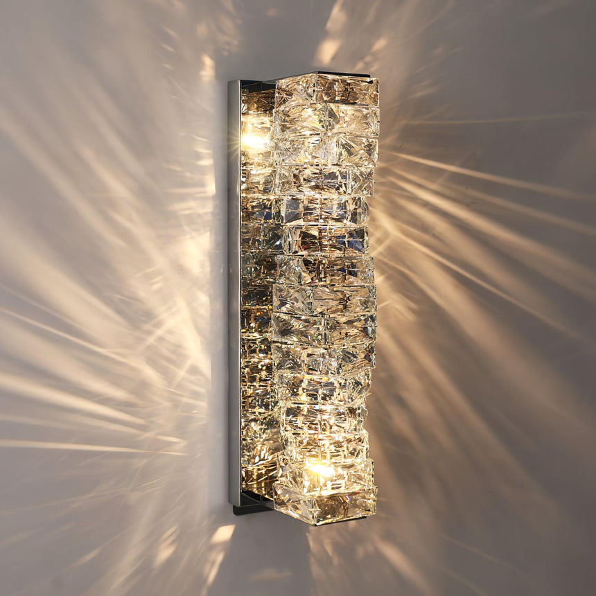 The tallest size lit, light streaming out between the crystal rows