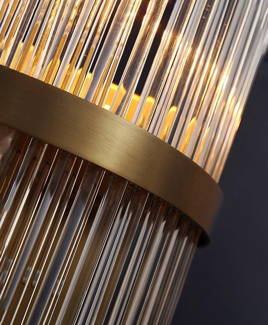 Close view of the brass band and the layered crystal rods