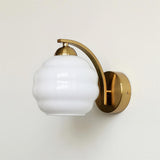 The gold version with a white ribbed glass globe