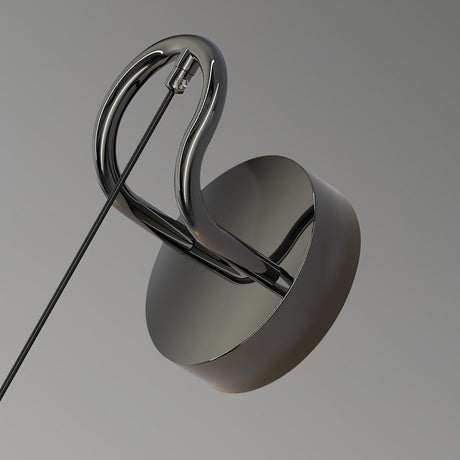 Close view of the curved hook on the round wall plate