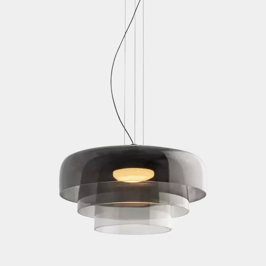 Gray three tier glass shade on a plain background