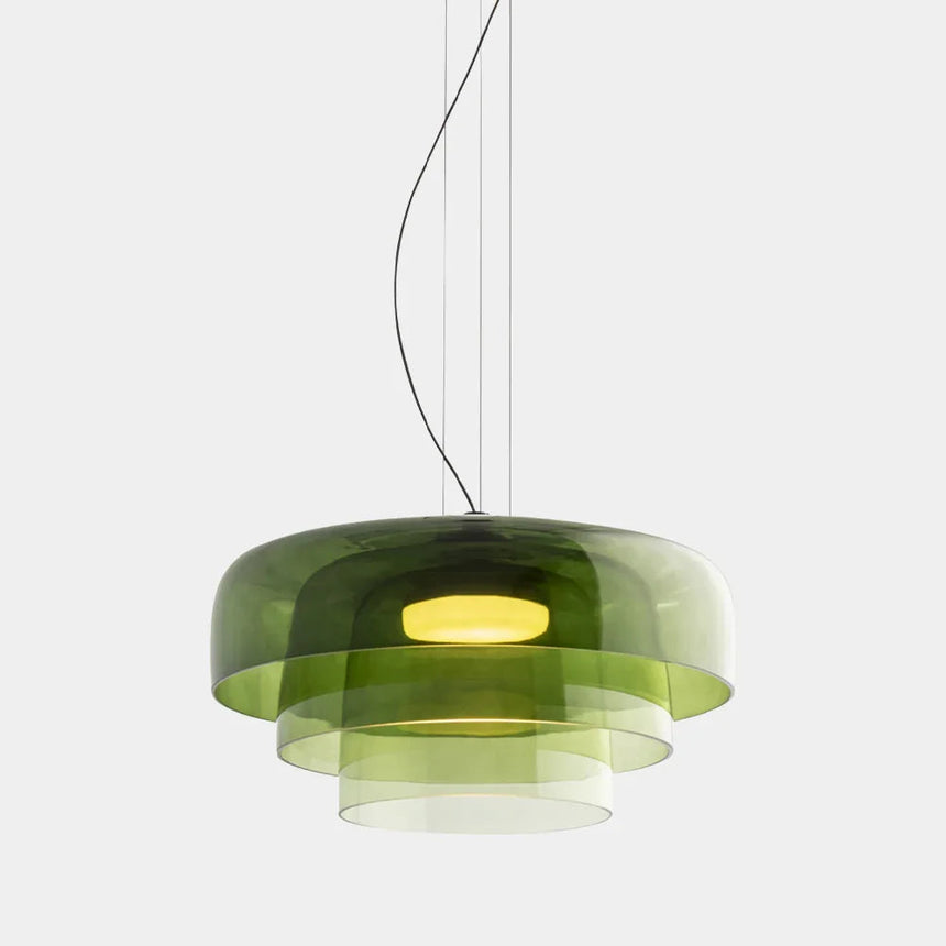Green three tier glass shade on a plain background