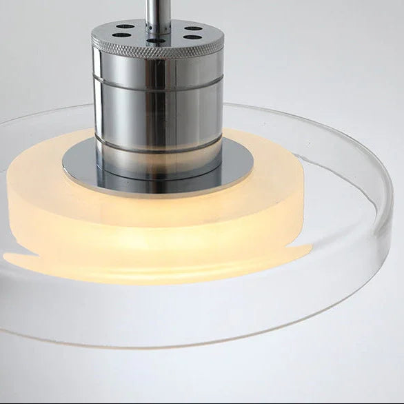 The chrome head seen close with the clear glass disc around the opal ring