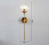 Torch wall light shown in a hallway