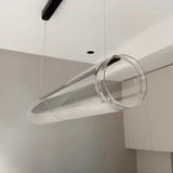 The clear tube seen from below against a white ceiling at an angle