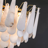 Rows of alabaster petals overlapping, warm light passing between them