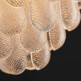 The diamond pattern molded into the glass petals, seen very close