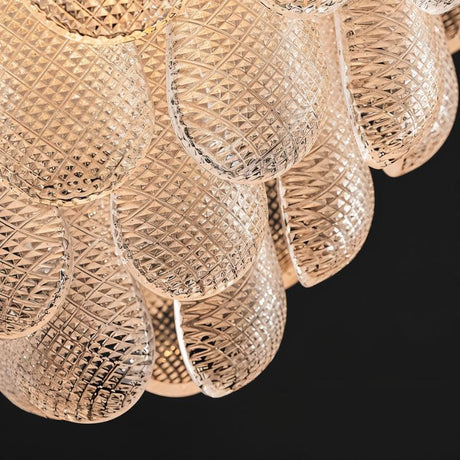 The diamond pattern molded into the glass petals, seen very close
