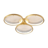Larger three ring gold ceiling light on a white backdrop