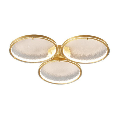 Larger three ring gold ceiling light on a white backdrop