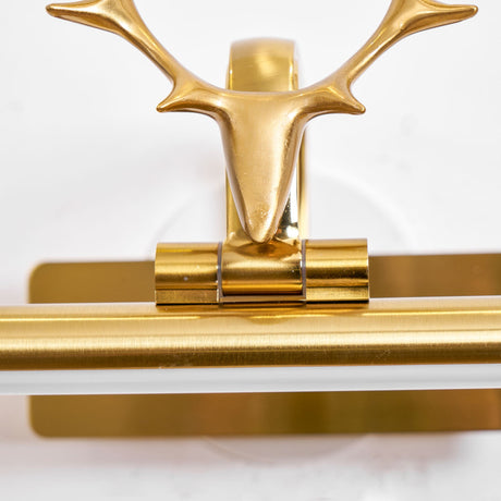 Close view of the stag head seen from the front above the gold bar