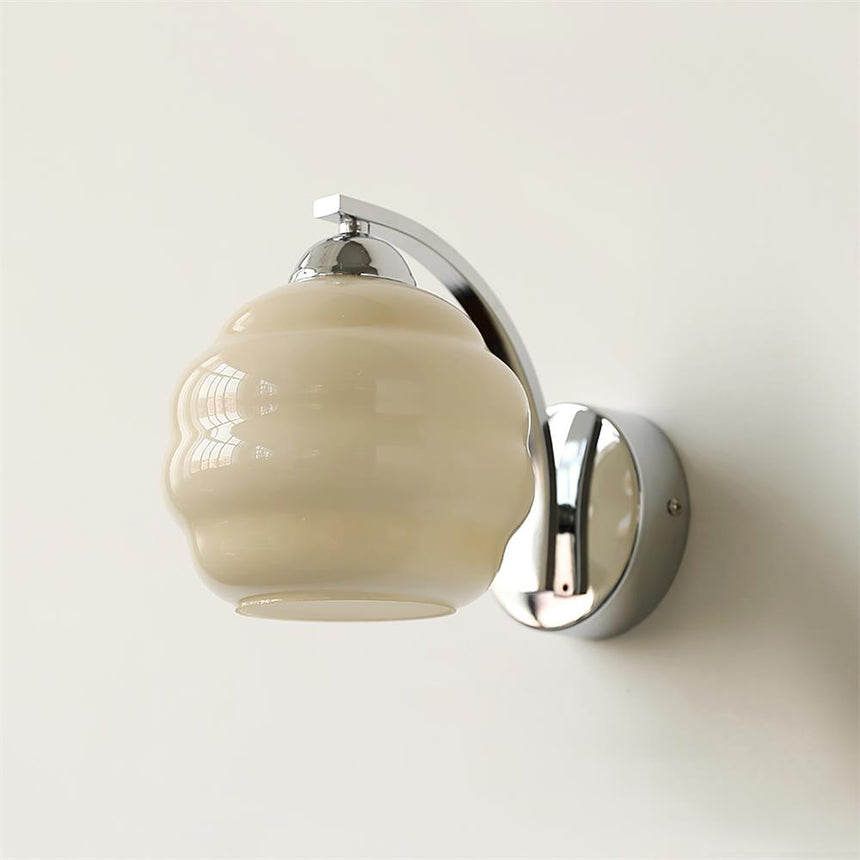 The chrome version with a beige ribbed glass globe