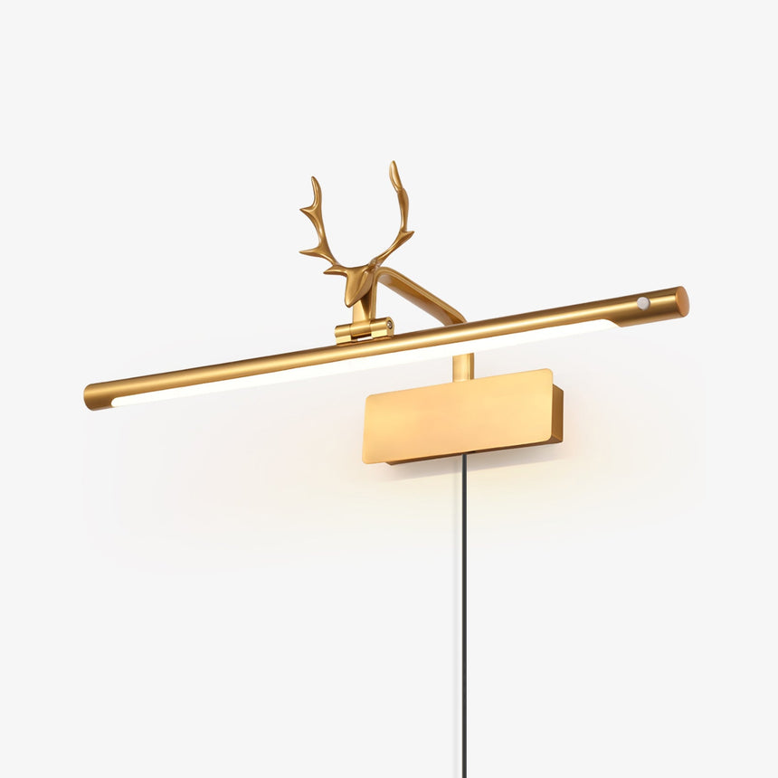 Gold bar with a cast stag head, the cord dropping from the plate down the wall