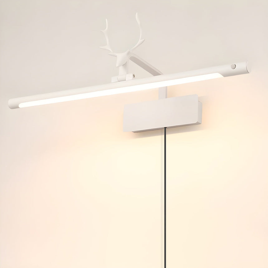 The white version lit on a pale wall, a white stag head over a plain white bar