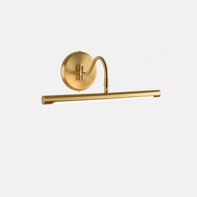 The gold version seen at an angle, the curved arm rising from the round plate