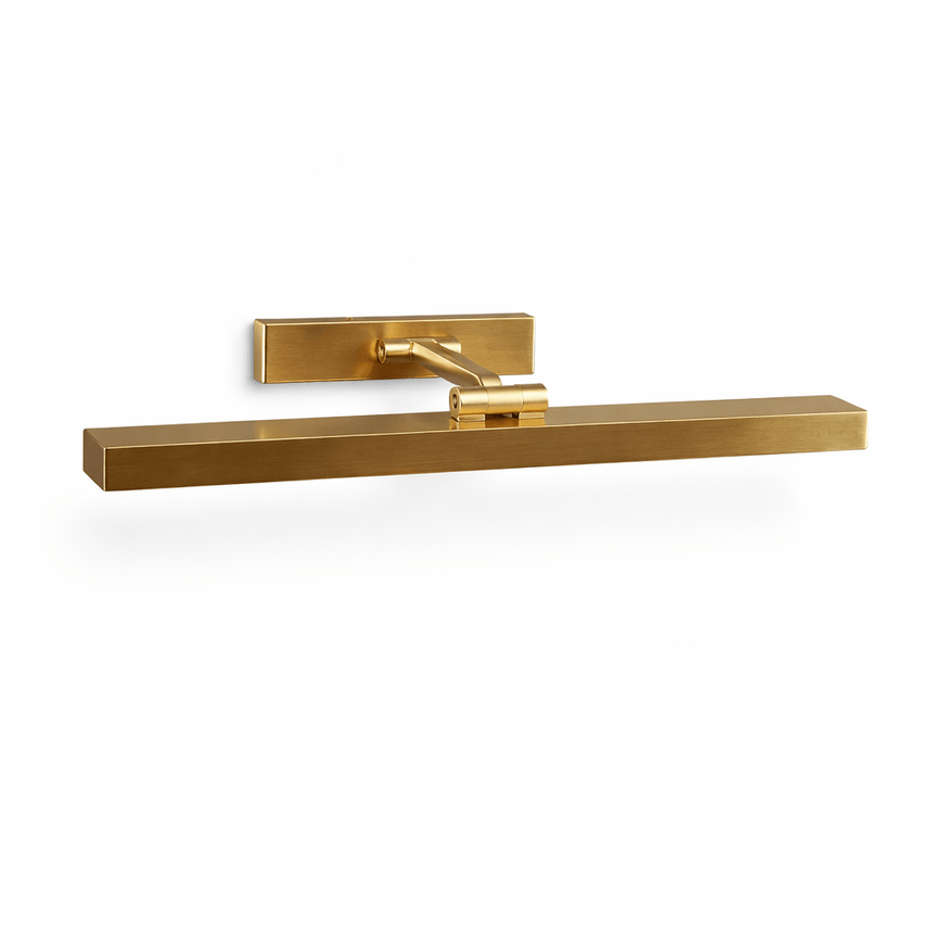 The gold bar seen at an angle, the pivot visible where the yoke grips it