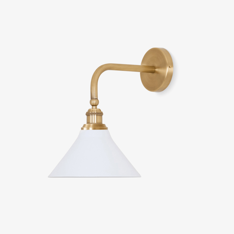 Brass gooseneck wall sconce with a white cone shade hanging from the curved arm