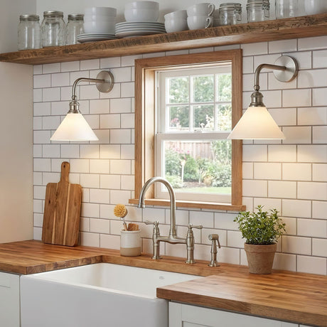 Two gooseneck sconces either side of a kitchen window above a farmhouse sink