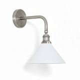 The nickel finish with the white cone shade on a pale background