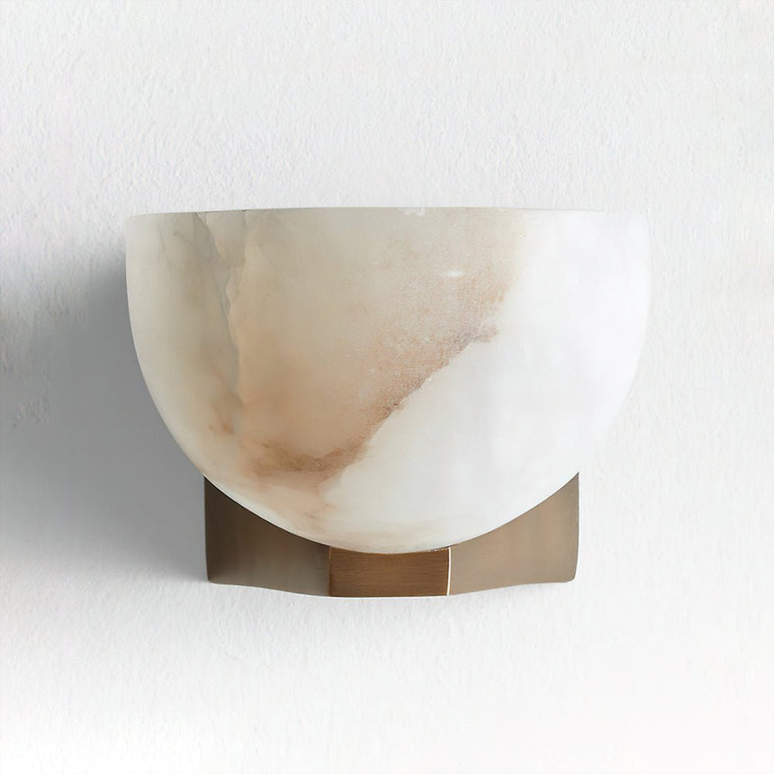 Front view of the stone bowl and the narrow metal plate behind it