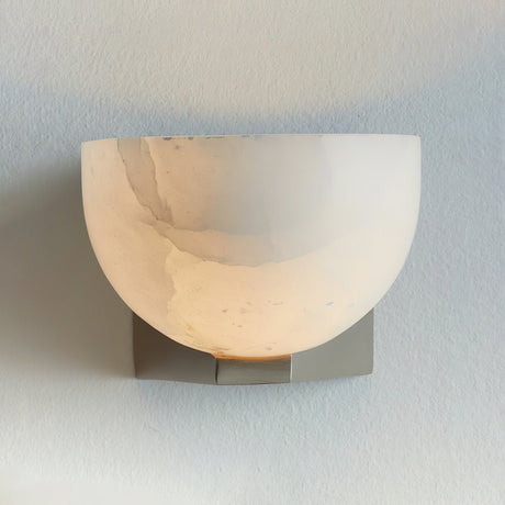 The nickel version with its stone bowl, seen on a pale background