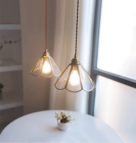 Brass pendant lamp fluted glass shade close-up