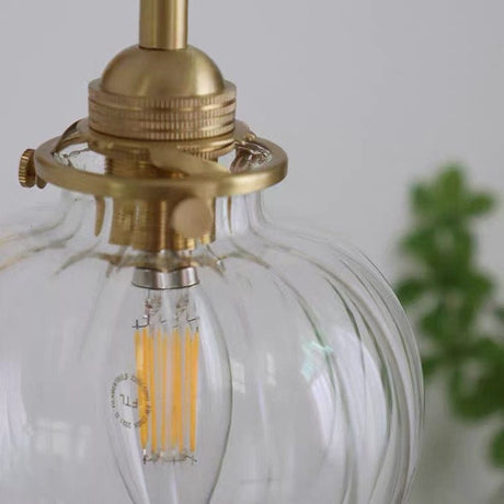 Glass Globe Wall Sconce for Kitchen Accent