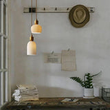 Ribbed ceramic pendant light with bulb included