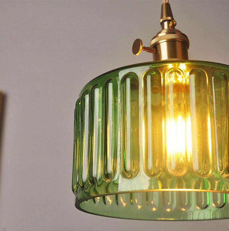 Brass pendant lamp cylinder shade close-up