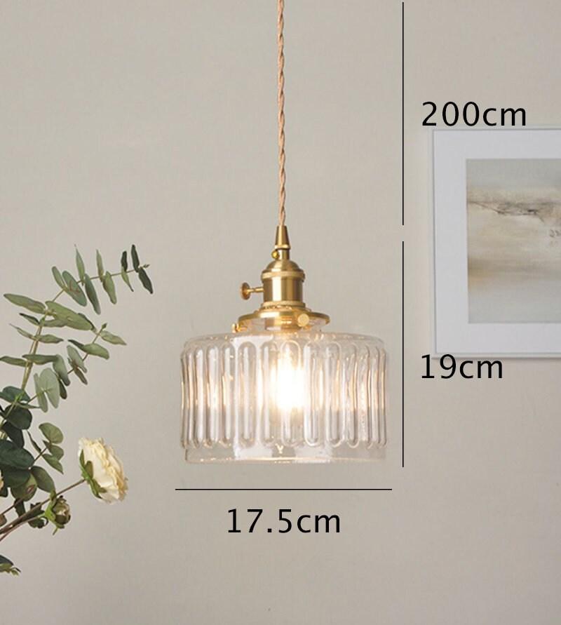 Fluted glass pendant light warm welcoming glow scene