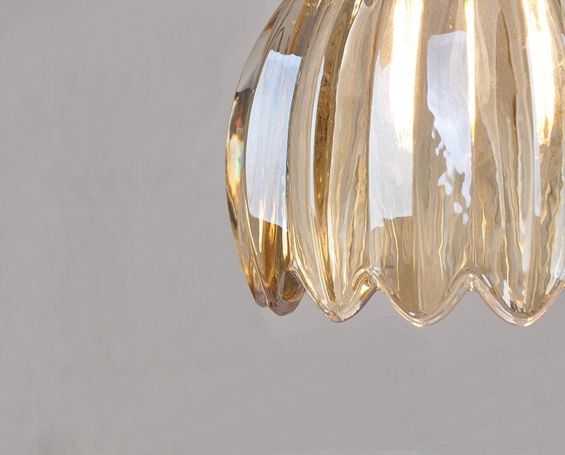 Floral glass pendant light warm ambient glow scene