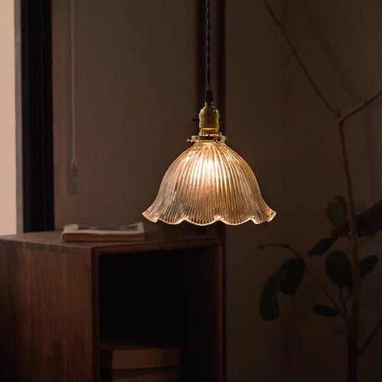 Brass pendant lamp cord and canopy detail