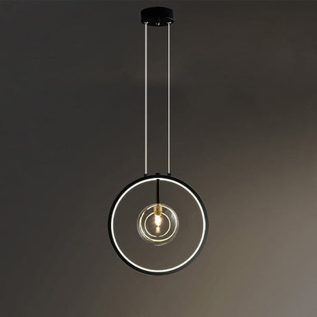 Glass pendant light above kitchen counter