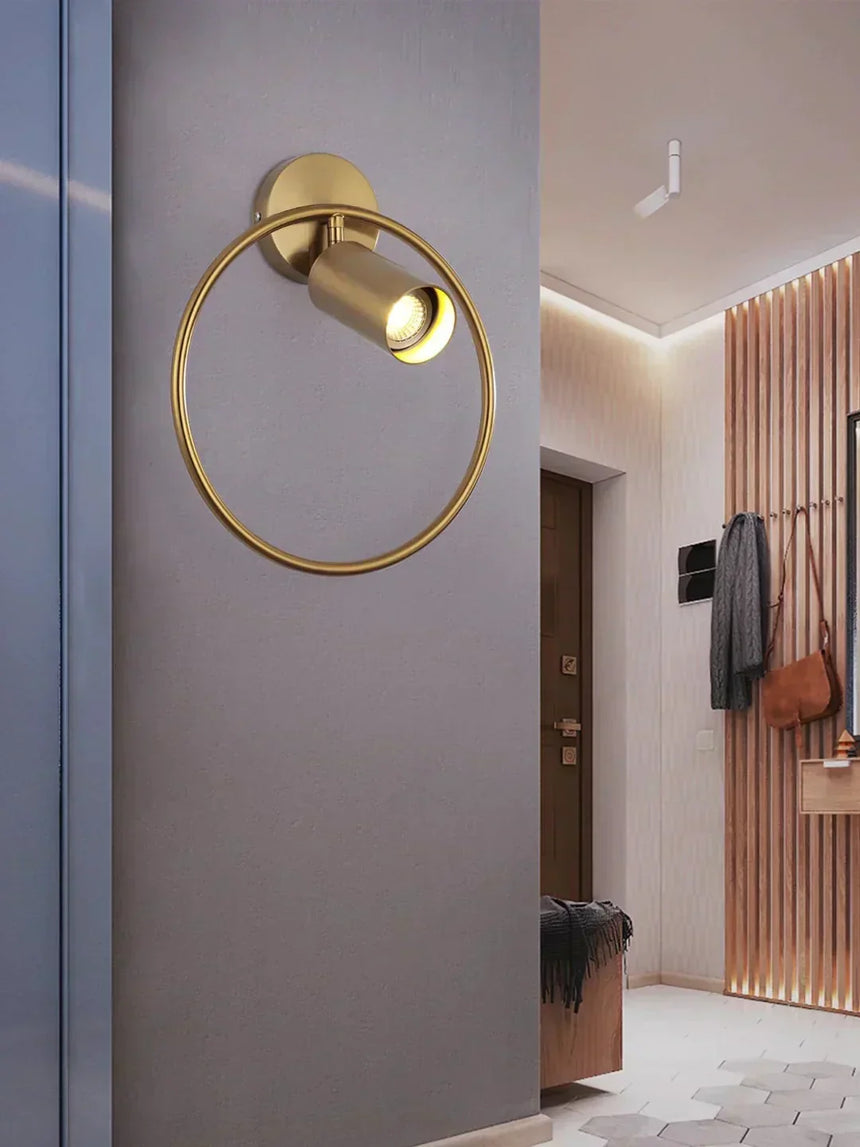 Glass wall lamp shown in a bedroom