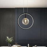 Sputnik-style glass globe pendant for dining table
