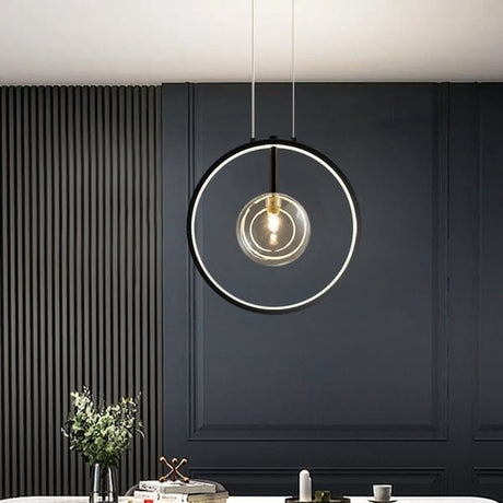Sputnik-style glass globe pendant for dining table