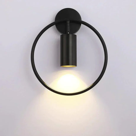 Aluminium and iron detail on wall lamp